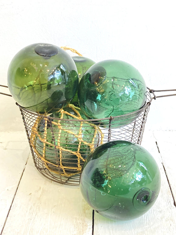 Old green glass fishing floats