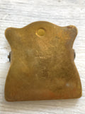 Old engraved brass paper clip