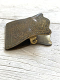 Old engraved brass paper clip