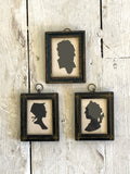 Trio of framed silhouettes