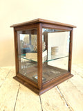 Victorian mirror-backed display cabinet