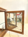 Victorian mirror-backed display cabinet