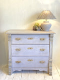 Painted continental chest of drawers