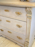 Painted continental chest of drawers