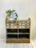 Rustic storage cabinet with drawers