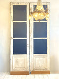 Pair of large mirrored antique doors