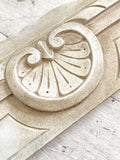 Small painted carved pediment