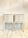 Pair of painted French bedside cabinets