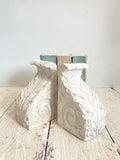 Pair of plaster corbels
