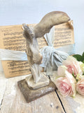 Old plaster winged goddess Victory figure