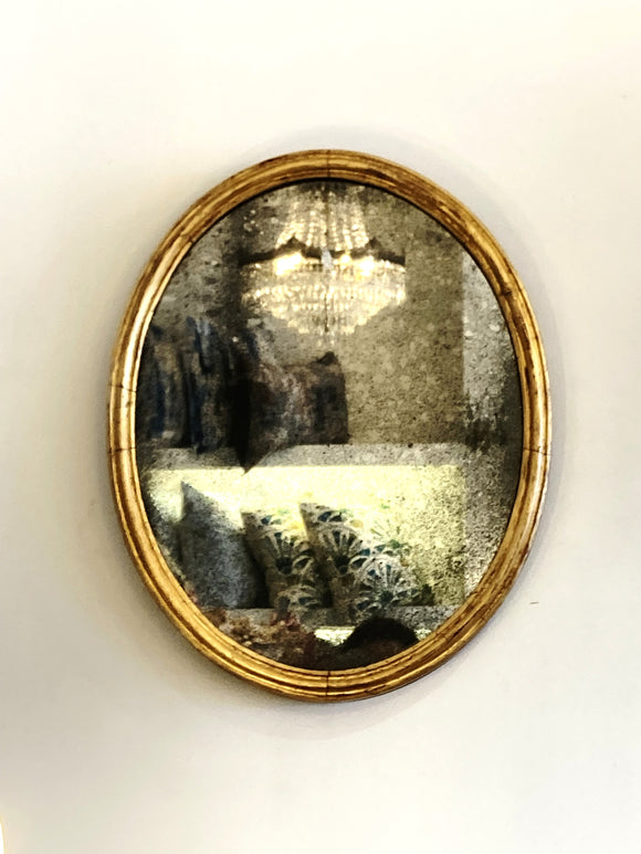 Victorian gilt mirror with very foxed plate