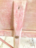 Old pink French child's wheelbarrow