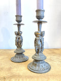 Pair of antique cherub candlesticks