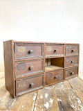 Rustic antique tabletop drawers