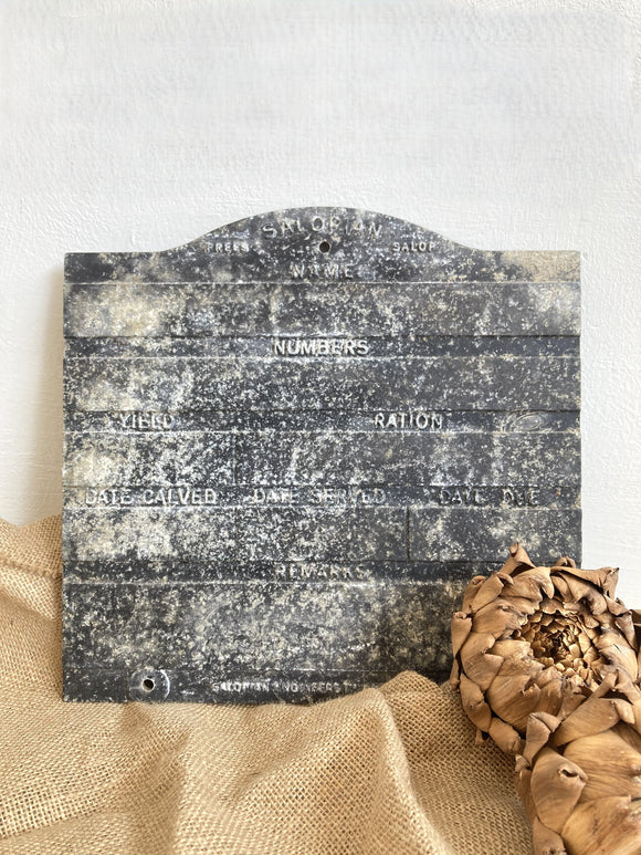 Old metal agricultural plaque