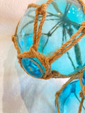 3 glass fishing floats