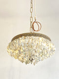 Antique multi-tier chandelier with iceberg crystals