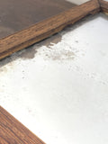 Small antique foxed mirror B