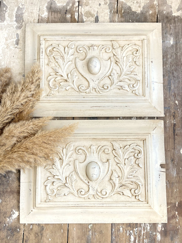 Pair of antique carved panels