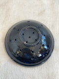 Old blue glazed strainer