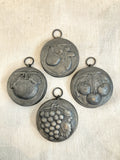 Set of 4 antique pewter moulds