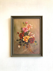 Framed floral oil on board