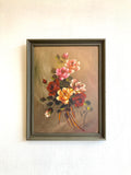 Framed floral oil on board