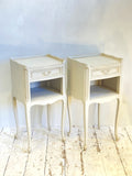 Pair of painted French bedside tables