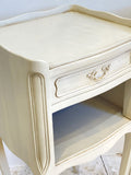 Pair of painted French bedside tables