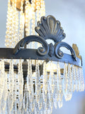 Antique chandelier with sea shell motifs