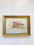 Framed floral oil on board