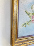 Framed floral oil on board
