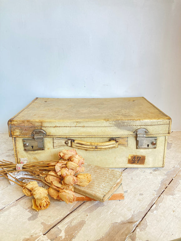 Vintage vellum suitcase