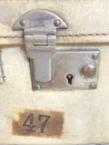 Vintage vellum suitcase