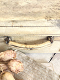 Vintage vellum suitcase