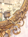 Large elegantly knackered antique gilt mirror
