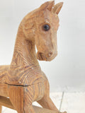 Little hand-carved toy rocking horse